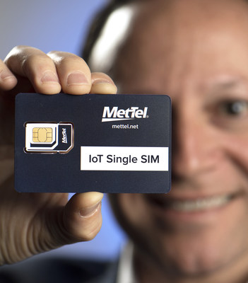 MetTel Vice President for Mobility and IoT, Max Silber, displays the IoT Single SIM which self-reports real-time on-session activity, providing a current view of product/component status and location on anything from a mobile phone to a jet engine on Thursday, June 15, 2017, in NYC. (Jon Simon/Feature Photo Service for MetTel)