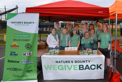 The Nature's Bounty Co. We Give Back Team poses for a picture at the Long Island Special Olympics in May.