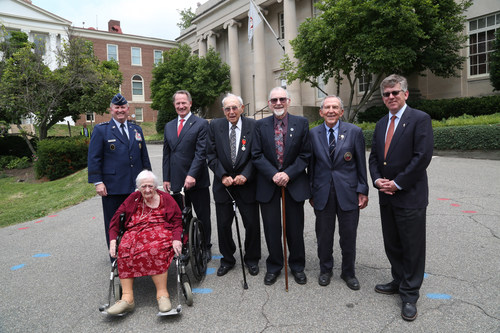 (l to r) Marion Frieswyk, Lt. Gen. Thomas Trask, Amb. Daniel Smith, Paul Roberts, John Billings, Art Reinhardt and Charles Pinck in front of the OSS headquarters on Navy Hill in Washington, D.C., on June 16, 2017.