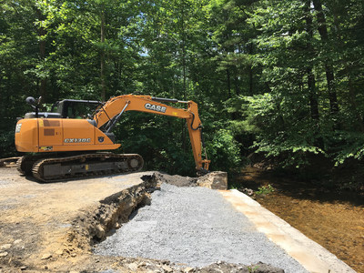 A CASE excavator works on the Old Forge Bridge project near Quincy Township, Pennsylvania!