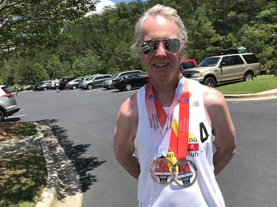 Greg Tooker with some of his medals from the Senior Games.