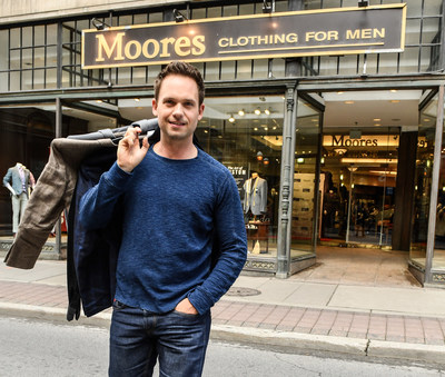 Suits star Patrick J. Adams donates suits to Moores’ Toronto store for the retailers’ 8th annual Canadian Suit Drive. Adams is urging Canadians to donate gently worn professional clothing at stores nationally throughout July. Donations are distributed to nearly 75 organizations that help disadvantaged men and women re-enter the workforce. Photo credit: George Pimentel