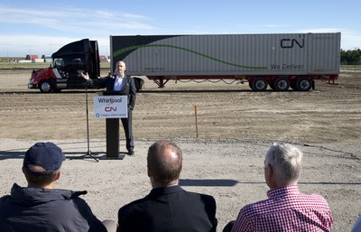CN's Assistant Vice President of Intermodal Andrew Fuller speaks Wednesday at a ground-breaking ceremony for Whirlpool Canada’s new distribution centre at CN’s Calgary Logistics Park. (CNW Group/CN)