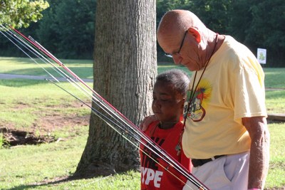 Tron Foster, who has struggled with bone cancer since he was six, and Tom Russell have formed a special relationship through Camp Victory, an annual summer camp sponsored by The Children's Security Blanket (CSB), a Spartanburg, SC based nonprofit providing support for children battling cancer co-founded by Russell. Tron will miss camp this July due to surgery scheduled to amputate his leg so Russell and CSB are holding a special camp just for him complete with his favorite pastime - fishing!