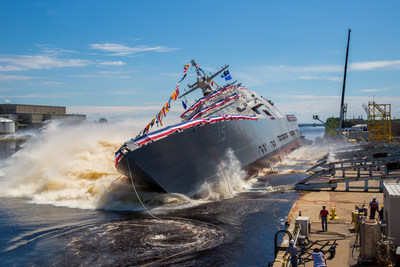 The 15th Littoral Combat Ship, the future USS Billings launches sideways into the Menominee River in Marinette, Wisconsin, on July 1. Once commissioned, LCS 15 will be the first ship to carry the name of Billings, Montana.