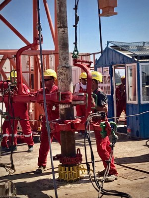 Drilling crew at work on Zion's Megiddo-Jezreel #1 well in Israel.
