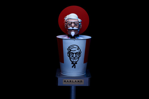 To celebrate National Fried Chicken Day, Kentucky Fried Chicken®& is bringing founder Colonel Harland Sanders to the drive-thru experience as robot chicken-expert H.A.R.L.A.N.D. (Human Assisted Robotic Linguistic Animatronic Networked Device).