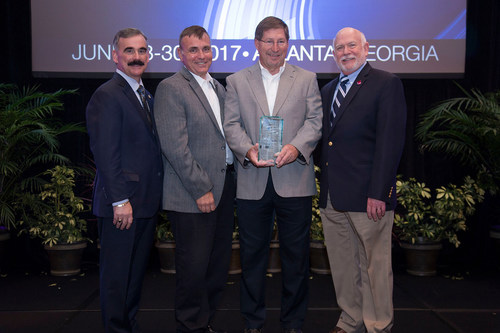 The Southeastern Electric Exchange, Inc. (SEE) recognized the Eight Flags Energy Combined Heat and Power Plant as a 2017 Industry Excellence Award winner. From left: Bryan Olnick, VP Operations, Florida Power & Light and Chairman, Engineering & Operations Committee for SEE; Warren DiNapoli, Sr. Operations Manager Northeast & Northwest Division, Florida Public Utilities; Mark Cutshaw, Director, Business Development & Generation, Florida Public Utilities; and Jim Collins, Executive Director, SEE.