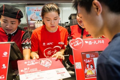 Chinese Olympic Gold medalist, Zhang Mengxue, visits Yunnan KFC to support the One Yuan Donation program