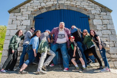 Kristian Nairn “holds the door” for unsuspecting tour goers on TripAdvisor’s #1 Game of Thrones Tour in Northern Ireland