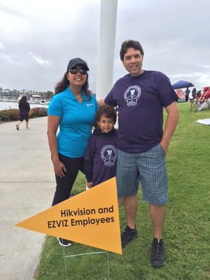The Barr family – Miki, Michael (a 40-year cancer survivor) and their son Adriaan – celebrating Hikvision/EZVIZ sponsorship of a JJCCC child in need at the recent annual Torch Run.