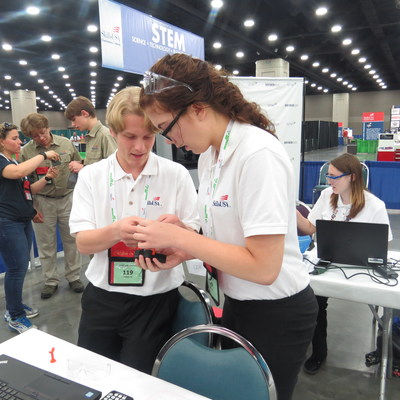 Davis Turpen (left) and Briana Lundquist (right) from Hastings Senior High School in Hastings, NE, work on their track piece fixture during the the 2017 SkillsUSA Additive Manufacturing Competition.