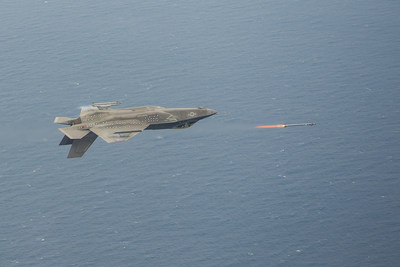 An inverted F-35C launches AIM-9X missile during a live fire test event, piloted by Maj Eric Northam June 8 from NAS Patuxent River, Maryland. Lockheed Martin photo by Dane Wiedmann