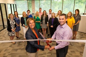 Ribbon-cutting ceremony held for new SageSure Insurance Managers office