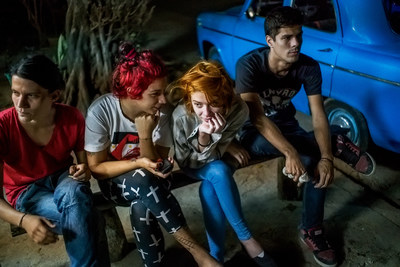 Michael Christopher Brown--Helen and friends wait for their $1.00 cheese pizzas in Playa neighborhood, Havana (Annenberg Space for Photography)