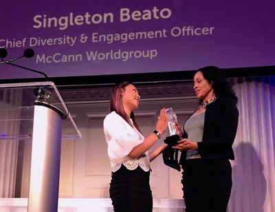Singleton Beato (r.) receives Gladiator award from 4A's/MAIP's Tien Dang.