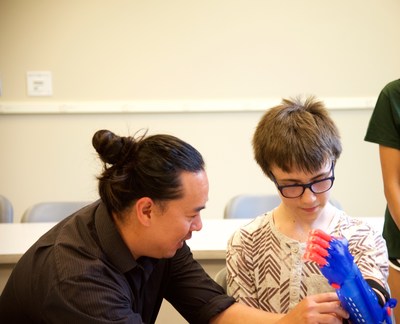 The Helping Hand Project at UNC Charlotte delivers prosthetic arm to young patient.