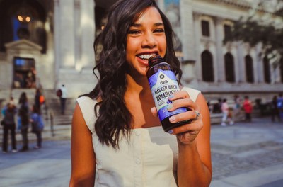 Hannah Bronfman sips Blueberry Basil, KeVita's new Master Brew Kombucha flavor.  (Photo Credit: Mel D. Cole for KeVita)