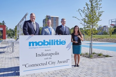 Mobilitie presents the “Connected City Award” to the city of Indianapolis and Full Circle Solutions CEO Lauren Riga. Pictured left to right: Mobilitie Regional Director Scott Hoff, Indianapolis City Council Minority Leader Michael McQuillan, Mobilitie Central Region Vice President Mitch Wywiorski, and Full Circle Solutions CEO Lauren Riga.
