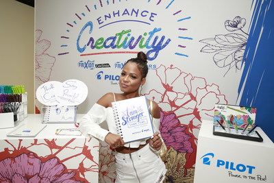 Christina Milian showing her Strength and getting Creative with Pilot's new Frixion Erasable pens. (PRNewsfoto/GBK)