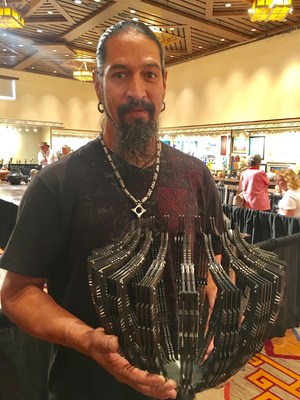 Pat Pruitt (Laguna Pueblo), 2017 Best of Show winner at Santa Fe Indian Market, with his winning piece. 