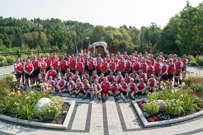 The participants of the Highway of Heroes Ride pose in Park of Reflection in Whitby during the start of the of Sunday’s ride. (CNW Group/Wounded Warriors Canada)