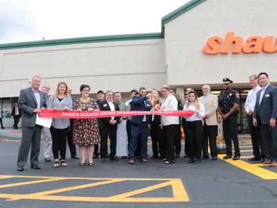 Shaw’s Hudson Store Director, Brian Michaud, is joined by community members, local town and state officials and employees for the Store Opening Ribbon Cutting Ceremony.