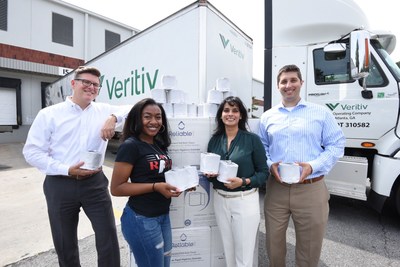 Love Rolls, Inc., takes donation of 25,000 rolls of toilet paper from Veritiv to assist the homeless community in Atlanta and across the U.S.  Pictured from left: Robert Moore with Veritiv, Kendall Robinson of Love Rolls, Inc., Martha Issa of Veritiv, and Colin Bradley of Veritiv.