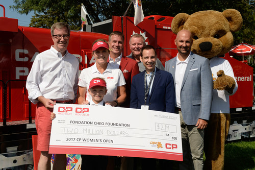 Jim Watson (Mayor of Ottawa), Lorie Kane (CP ambassador and Canadian Golf Hall of Famer), Zander Zatylny (CPWO child ambassador), Keith Creel (CP President and CEO), Kevin Keohane (President and CEO of CHEO Foundation), Alex Munter (President and CEO of CHEO Hospital), Laurence Applebaum (CEO of Golf Canada) gather for the $2 million cheque presentation, one of the largest charitable donations on the LPGA tour. (CNW Group/Canadian Pacific)