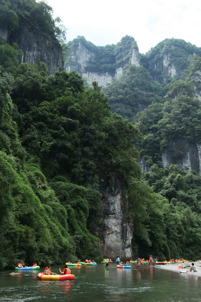 People rafting in the Shanmu River in summer, Shibing, Guizhou.