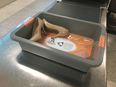 Mats and skins that debuted Tuesday on security checkpoint bins at the Akron-Canton Airport feature mineral nano-crystals that create a self-cleaning oxidation reaction that's stronger than bleach. The self-cleaning tools are sponsored by Western Reserve Hospital and supplied by NanoTouch Materials.