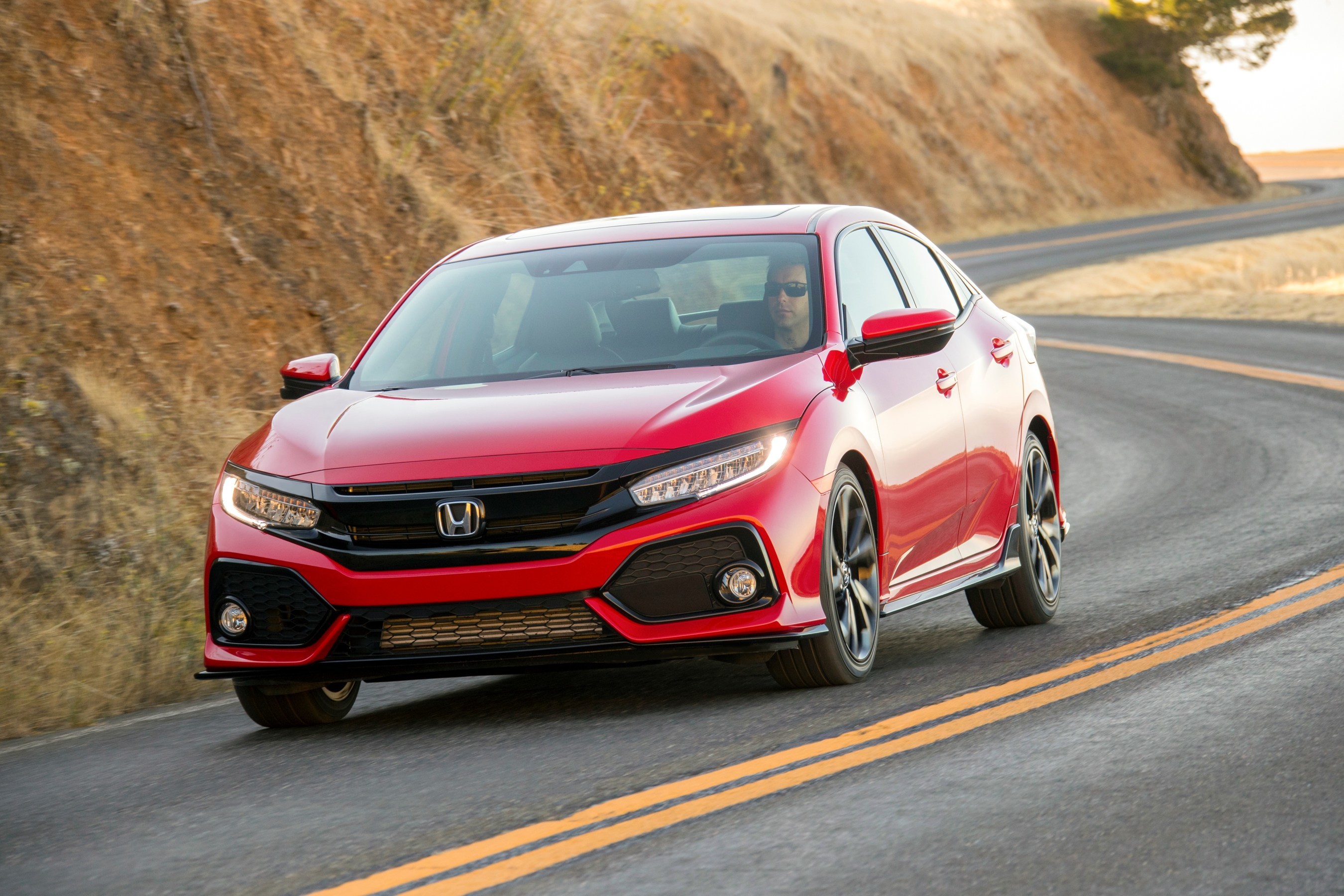 18 Honda Civic Hatchback Accelerates Into Dealerships