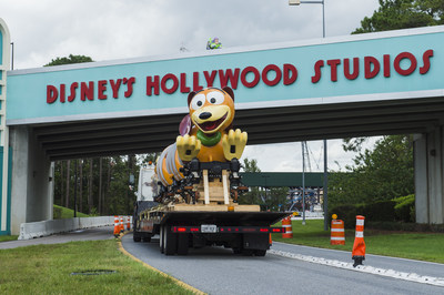 The first Slinky Dog Dash ride vehicle makes its way to Toy Story Land at Disney's Hollywood Studios in Lake Buena Vista, Fla. Slinky Dog Dash is a brand-new family coaster coming to the all-new Toy Story Land, opening summer 2018. Inspired by the playful dachshund spinoff of Slinky®, the classic American toy, Slinky® Dog Dash will send riders dipping, dodging and dashing around turns and drops that Andy has created to stretch Slinky® and his coils to the max. (Steven Diaz, photographer)