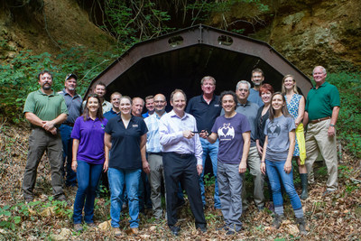 Employees from Unimin Corporation and the Organization for Bat Conservation celebrate the transfer of rights for the Magazine Mine.