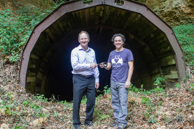 Campbell Jones, Unimin President & CEO, transfers the rights to the Magazine Mine, to Rob Mies, Executive Director for the Organization for Bat Conservation.