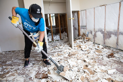 Habitat for Humanity volunteer Vira Griffin helps clean out homes flooded by Hurricane Harvey in northeast Houston in preparation for repairs.