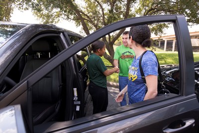 Sept. 2, 2017 – An Enterprise Rent-A-Car employee helps a local customer with a rental vehicle in Houston.