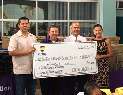 Presenting Ashford University's $10,000 check to San Diego Unified School District's Children and Youth in Transition Program are (from left to right): San Diego City Councilman David Alvarez, Ashford University College of Education Executive Dean Dr. Tony Farrell, Emerson/Bandini Principal Juan Romo, and San Diego Unified School District Superintendent Mitzi Merino.