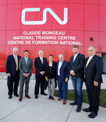 CN unveils the renamed Claude Mongeau National Training Centre in Winnipeg after former president and chief executive officer Claude Mongeau. Pictured left to right: Sean Finn, CN executive vice-president corporate services and chief legal officer; Brian Bowman, Mayor of Winnipeg; Luc Jobin, CN president and chief executive officer; Guylaine Mongeau; Claude Mongeau, former CN president and chief executive officer; Daniel Blaikie, MP Transcona; Robert Pace, CN chair of the board. (CNW Group/CN)