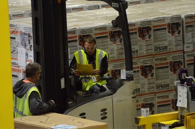 Workers at a Generac Power systems distribution center prepare shipments of generators bound for Florida and the Southeast in the company's response to Hurricane Irma.