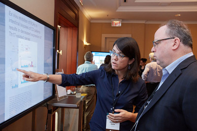 Discussing research during the Rainin Foundation's Innovations Symposium poster sessions. Photo credit: Mitch Tobias