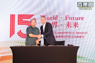 Huiyong Yu, the president of Pagoda, signing a cooperative agreement