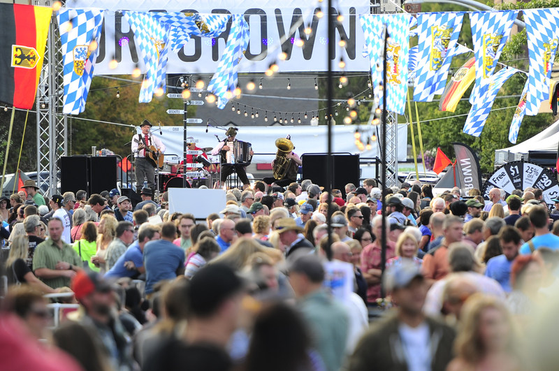 ORIG 09/16/2016 Ryan Brennecke / The Bulletin A crowd fills Oregon Avenue as the Mirko Pressler Band performs Oompah music during the first day of Octoberfest in Downtown Bend on Friday, Sept 16, 2016. The event is free to attend and continues today from noon until 10 p.m.