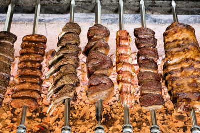 During lunch at several Texas de Brazil locations, guests can enjoy quality meats cooked the authentic Brazilian gaucho way --over open flame using natural wood charcoal which gives the meats a deeper, more intense flavor and just the right amount of smokiness.