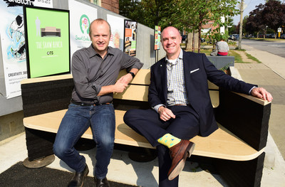 Councillor Mike Layton and Ontario Tire Stewardship Executive Director, Andrew Horsman test The Shaw Bench, created by Sheridan College Industrial Design students using recycled tires, installed at Artscape Youngplace. (CNW Group/Ontario Tire Stewardship)