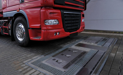 A truck prepares to drive over a fully-automated tire inspection system made by Ventech Systems GmbH. The innovative device can quickly and easily check tire pressure, tread depth and vehicle weight. The Goodyear Tire & Rubber Company has agreed to acquire Ventech Systems of Dorsten, Germany, from Grenzebach Maschinenbau GmbH.