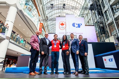 The newly announced 11-year partnership between Cadillac Fairview (CF) and the Canadian Olympic Committee (COC) names CF the new Home of Team Canada. CF retail and office properties will provide a physical space for Canadians to experience the Olympic spirit and support Team Canada during and in between games. From right to left: Jason Anderson, CF, John Sullivan, CF, Dylan Moscovitch, Olympic Silver Medalist, Shelley-Ann Brown, Olympic Silver Medalist, Chris Overholt, COC, and Derek Kent, COC (CNW Group/Cadillac Fairview Corporation Limited)