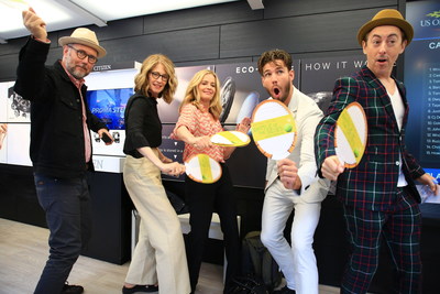 Battle of the Sexes cast members swing away in the Citizen booth during the US Open Women's Finals. (Jonathan Dayton, Valerie Faris, Andrea Riseborough, Austin Stowell, Alan Cumming)