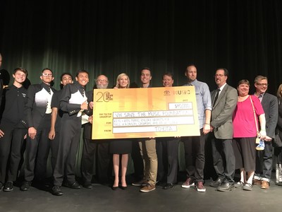 Band students, school officials, and executives from Toyota, VH1 Save The Music Foundation and Life is Beautiful Festival on stage during the grant presentation at Clark High School in Las Vegas.