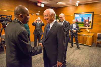 BBVA Executive Chairman Francisco González, right, greets Houston Mayor Sylvester Turner at City Hall on Friday.